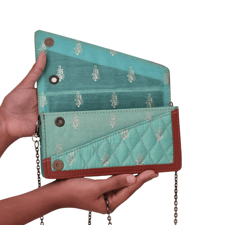Booti prints on Chanderi fabric clutch with leather border