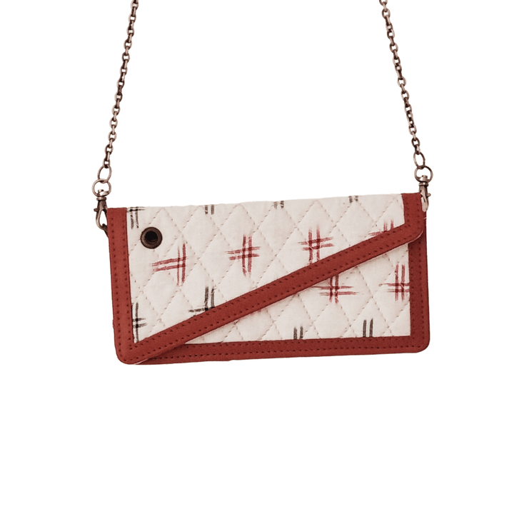 Geometric prints on Ikkat Cotton Fabric clutch with leather border